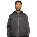 Front view of Male model wearing Chisel Hooded Jacket in gravel colorway. @color_gravel