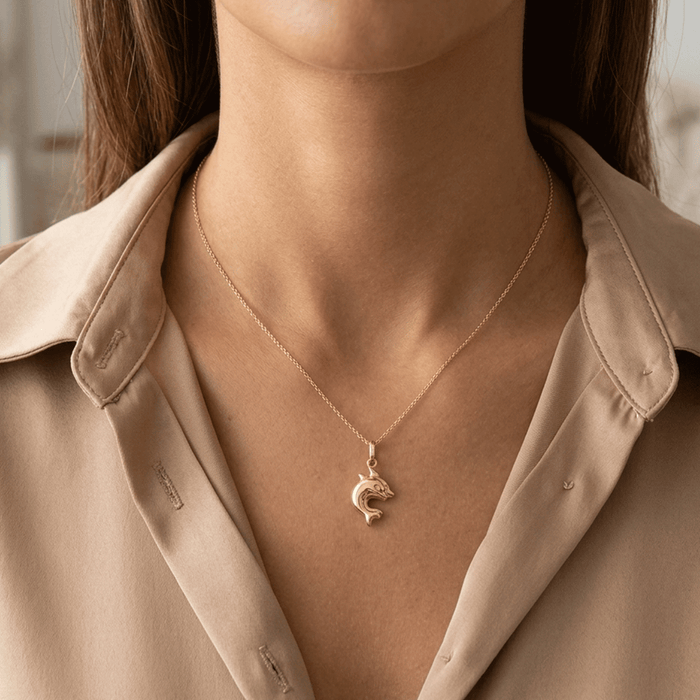 Dije Forma de Defín en Oro 18k