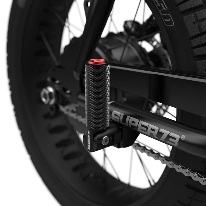 Folding peg with red cap on bike. @color_red