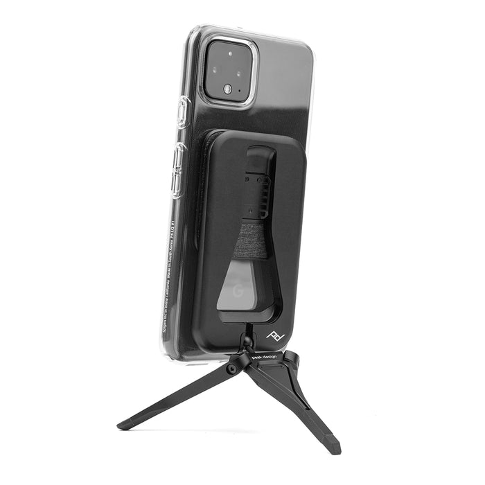 Back view of an iPhone attached to a small tripod using the Peak Design Universal Phone Adapter