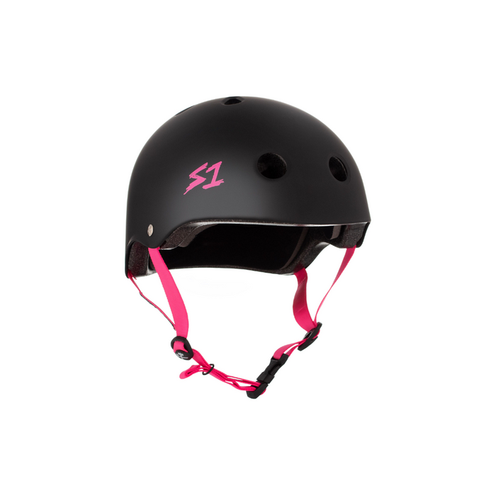 Slight side view of the S1 helmet in matte black with pink straps on a white background @color_black matte w/ pink straps