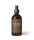 Applying natural lymphatic lotion to the legs with gentle massage for lymphatic drainage and circulation.