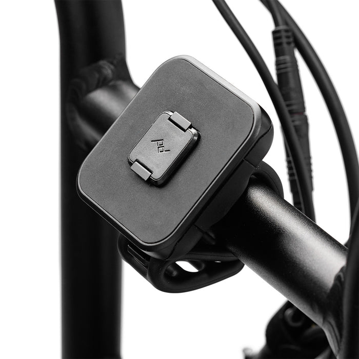 Close-up of the Universal Bar Mount installed on a bike handlebar