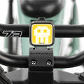 Skull light mounted on bike with white background