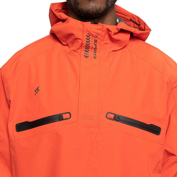 Detail shot of Male model wearing Vale Packable Anorak in blood orange colorway. @color_blood orange