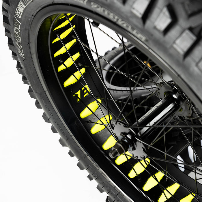 Detail shot of GRZLY tire with yellow tire liner. @color_yellow